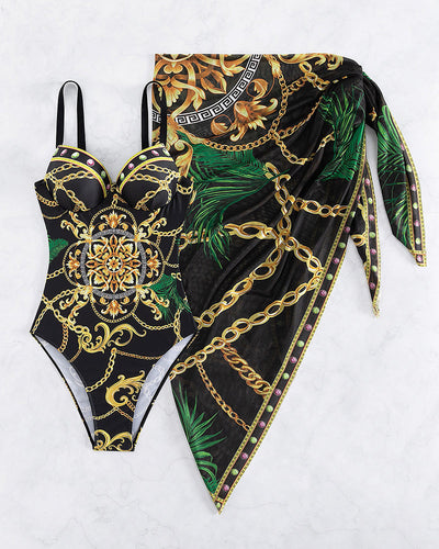 Clara® | Push-up one-piece swimsuit with decorative chain details and beach skirt